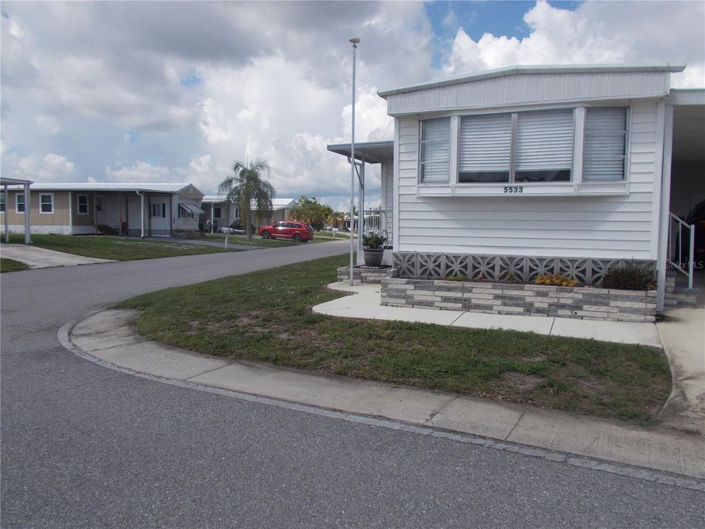 Photo of 5533 Holiday Park Boulevard, North Port, FL 34287 (MLS # C7528010)