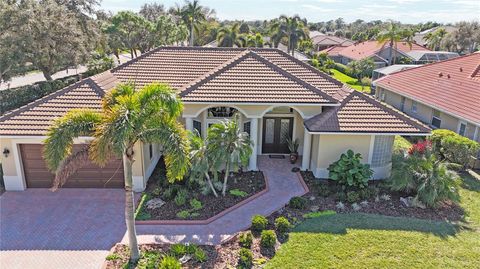 Photo of 4798 Hanging Moss Lane, Sarasota, FL 34238 (MLS # A4678193)