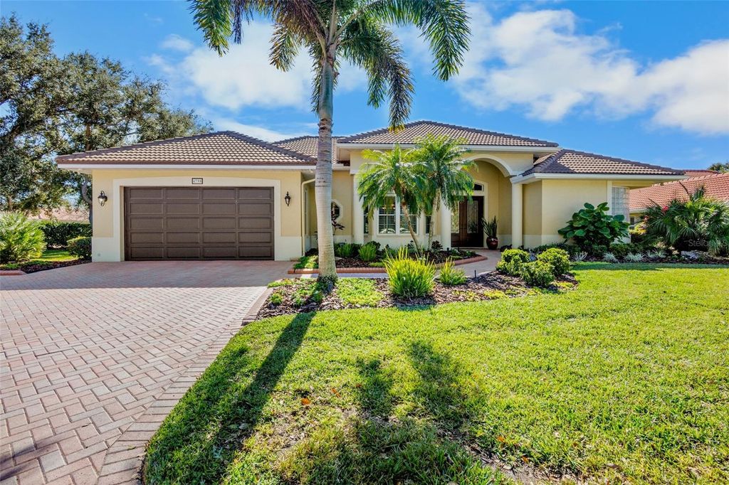 Photo of 4798 Hanging Moss Lane, Sarasota, FL 34238 (MLS # A4678193)