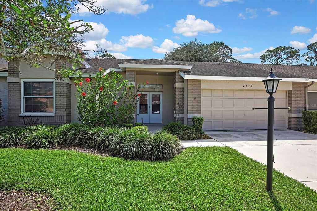 Photo of 2439 Hidden Trail Drive, Spring Hill, FL 34606 (MLS # TB8442234)