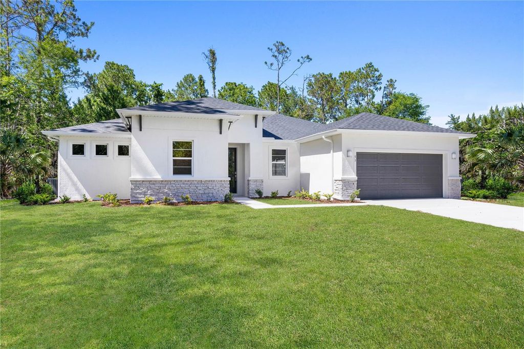Photo of 28 Eastmoor Lane, Palm Coast, FL 32164 (MLS # FC314478)