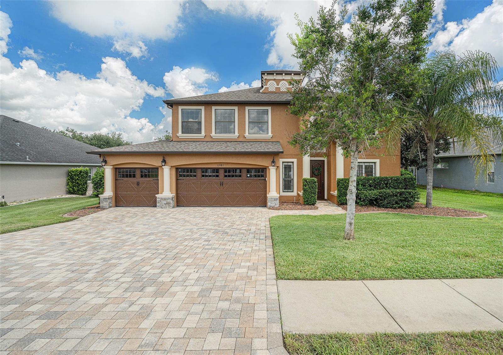 Stunning Five Bedroom-Four bathroom home in the Pristine Place Subdivision of Spring Hill, with over 4,000 square feet of perfect living space. It's all about the details for this home...crown and base moldings, high ceilings, decorative ceiling fans, Quartz Countertops, Gourmet Kitchen with updated stainless steel appliances surround by wood cabinetry, which is the centerpiece of an open floor plan that flows comfortably into family room, with french doors that leads out to the lania & salt water pool area in superb condition! The kitchen & family room ends into the primary bedroom featuring a large walk-in closet, spacious modern bathroom with quartz counters and ceramic tile flooring and walls. All of that is just downstairs, upstairs there are four very large bedrooms with ceiling fans and large closets. One of the upstairs bedrooms has an en-suite bath giving this home two master bedrooms! Pristine Place has low HOA with amenities such as Clubhouse, Community Pool, Gated Community, and more. New Hardwood flooring throughout this home gives it a regal one of a kind home. This home was built with love using nothing but the best and highest quality flooring, light fixtures, and overall design. The price is a bargain for the quality this home offers and future value. Topping it all off is a 3 car garage! This home is a MUST see and purchase!