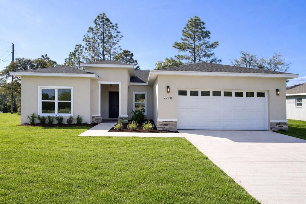 Photo of 9778 N Chapel Way, Citrus Springs, FL 34433 (MLS # O6392212)