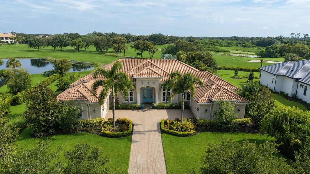 Photo of 3737 Founders Club Drive, Sarasota, FL 34240 (MLS # A4708005)