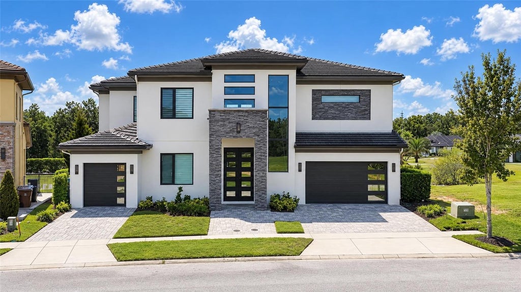 Photo of 1196 Castle Pines Court, Kissimmee, FL 34747 (MLS # O6442558)