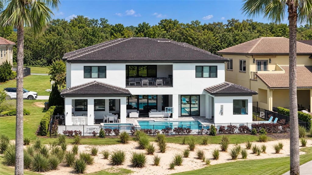 Photo of 1196 Castle Pines Court, Kissimmee, FL 34747 (MLS # O6442558)