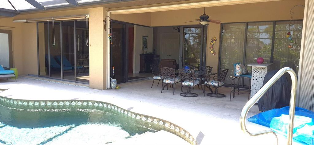 Photo of 19 Medalist Way, Rotonda West, FL 33947 (MLS # D6146841)