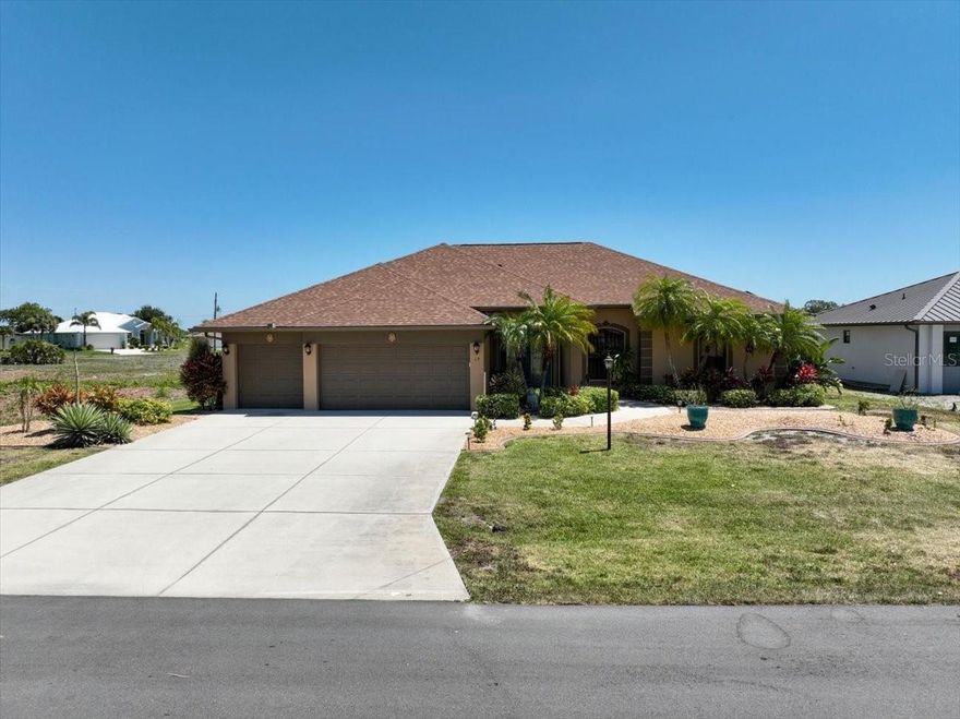 MOVE-IN READY POOL HOME!

Step into effortless Florida living with this stunning, fully furnished 3-bedroom + den (optional 4th bedroom), 3-bath pool & spa home located in the highly desirable community of Rotonda West. Whether you're searching for a full-time residence, vacation retreat, or income-producing property—this home is ready for you to move right in and start enjoying.

From the moment you arrive, you’ll be impressed by the lush, mature landscaping and inviting curb appeal. Inside, elegant French doors open to a spacious entryway, leading to a beautifully designed interior featuring 20x20 ceramic tile flooring and soaring coffered ceilings that create a bright, upscale atmosphere.

The heart of the home is the open-concept living space, perfect for entertaining. Enjoy seamless indoor-outdoor living with pocket sliding glass doors that fully open to the lanai—bringing the outdoors in and expanding your entertaining space.

The designer kitchen is both stylish and functional, featuring:

Granite countertops
Wood cabinetry
Breakfast bar
Stone backsplash
Full appliance package

The split-bedroom floor plan offers privacy for family and guests, while the den with a built-in closet easily converts to a 4th bedroom, adding flexibility and value.

Step outside to your private backyard oasis—a true highlight of the home. Relax in the heated, pebble-finish pool and 4-person spa, or entertain guests in the spacious screened lanai with a desirable southeast exposure. The outdoor kitchenette and bar area make this the ultimate space for hosting and enjoying Florida’s year-round sunshine.

Additional features buyers love:

3-car garage (ideal for storage, workshop, or golf cart)
Indoor bar area
Interior laundry room
Hurricane shutters for peace of mind
Irrigation system sourced from canal
Located in an X flood zone (no flood insurance typically required)

Major updates already done for you:

Roof (2023)
Pool pump (2024)
Dishwasher & microwave (2024)
Washer (2023)
A/C (2018)
Solar panels (2018) for lower electric bills

Located in Rotonda West, a deed-restricted community offering 5 public golf courses, walking trails, bike paths, and a community park with tennis, pickleball, and more.

Just minutes from pristine Gulf beaches, world-class fishing, Boca Grande, shopping, dining, and local events, this home delivers the lifestyle buyers are dreaming of.

Don’t miss this opportunity—homes like this, fully furnished and move-in ready, don’t last long. Schedule your private showing today and start living the Florida lifestyle!
