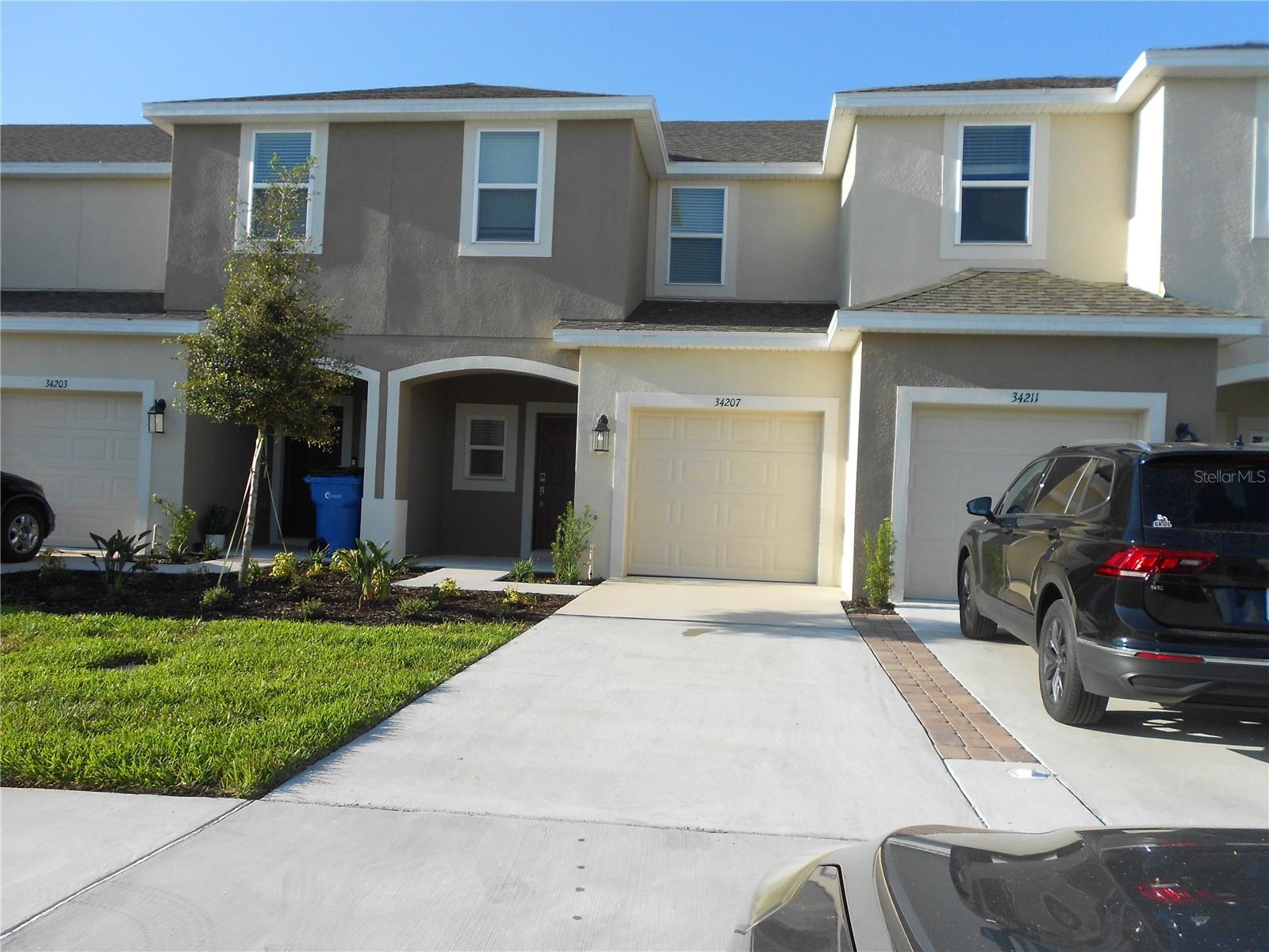 Beautiful like new townhome at River Landing, 3 bedrooms x 2 1/2 bathrooms x 1 car garage. The kitchen and living/dining combo share the same illuminated and open space that leads through sliding doors to the outdoor patio with a nice and relaxing view to a big pond. The kitchen has a spacious pantry, quartz counter tops, classic back splash and stainless steel appliances ready for first time use. Half bathroom, storage space and direct access to the attached garage are also located in first floor. In the second floor are located the master bedroom, the second full bathroom, the two secondary bedrooms and the laundry closet equipped with new washer and dryer. The master bedroom has its walk-in closet and on suite master bath with double sink, quartz counter top and walk-in shower. This townhome conveniently located very close to Morris Bridge Rd and I75, outlet mall, Wiregrass mall, hospitals, etc.