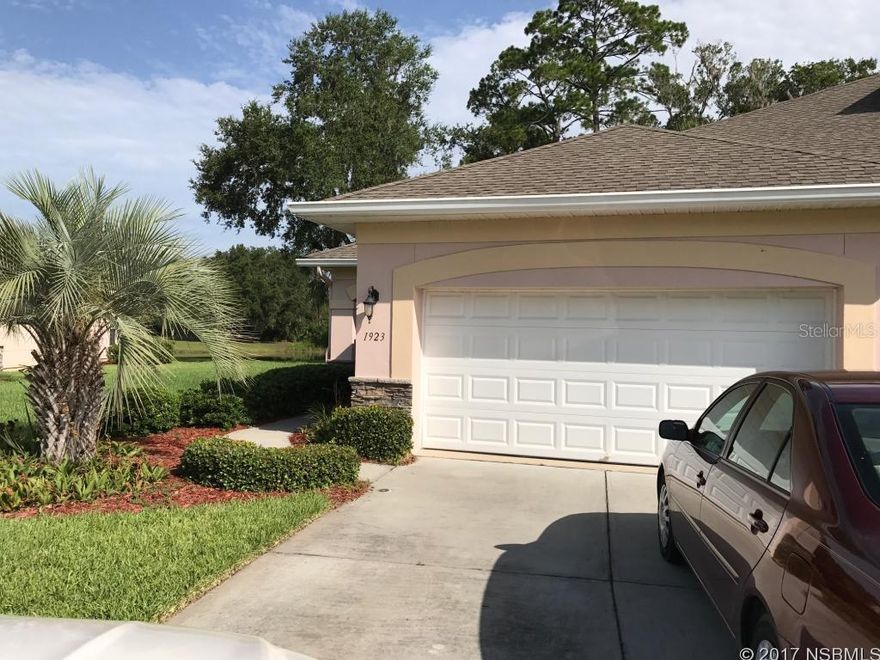 Lovely well cared for home in Exclusive Turnbull Bay Estates located on Turnbull Lakes Drive - this end unit  backs up to the conservation area. No homes behind you only birds and wildlife gorgeous water and nature setting.  2 bedrooms 2 bathrooms, lots of closet space, open floor plan, Jacuzzi tub in the master bath in addition to the walk in shower, single level no stairs, large 2 car garage, separate inside laundry area, kitchen features stainless steel appliances and granite countertops. Rent includes community pool access  -lawn care and pest control, NO PETS  available Sept 1st