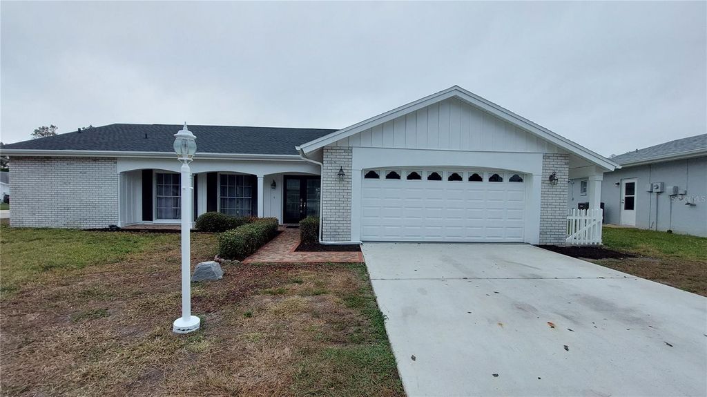 Photo of 8601 Sagewood Drive, Hudson, FL 34667 (MLS # TB8454381)