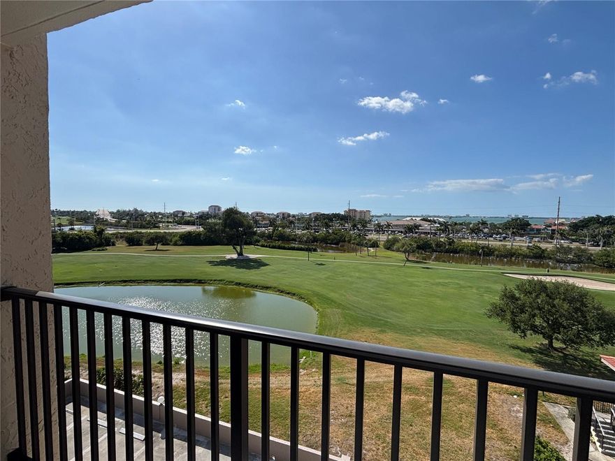 Wake up to tropical island views and unwind with breezy golf course vistas from this inviting top-floor Isla del Sol condo. Located in the desirable waterfront community of Palma Del Mar, this updated 1-bedroom, 1.5-bath residence offers an easy coastal lifestyle with a bright open living area, updated kitchen with stone countertops, white cabinetry, stainless steel appliances, and tastefully refreshed baths. Step out to the balcony and take in the relaxed resort setting, surrounded by palms, green space, and sparkling water views beyond. Enjoy Palma Del Mar’s waterfront pool and spa, fishing pier, kayak storage/launch, and gathering spaces, all just minutes from beaches, boating, dining, downtown St. Pete, and Fort De Soto. Florida living made easy.