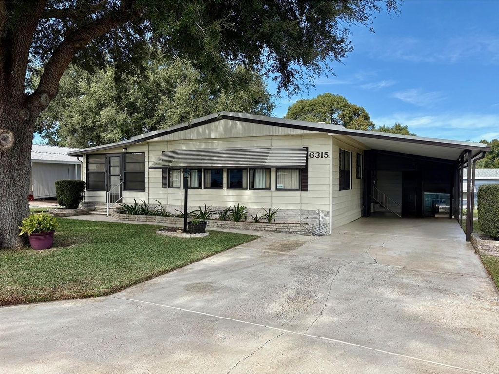 Photo of 6315 Grove Pointe Drive SE, Winter Haven, FL 33884 (MLS # P4936981)