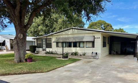 Photo of 6315 Grove Pointe Drive SE, Winter Haven, FL 33884 (MLS # P4936981)