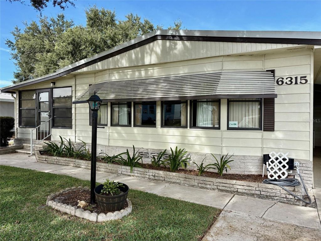 Photo of 6315 Grove Pointe Drive SE, Winter Haven, FL 33884 (MLS # P4936981)