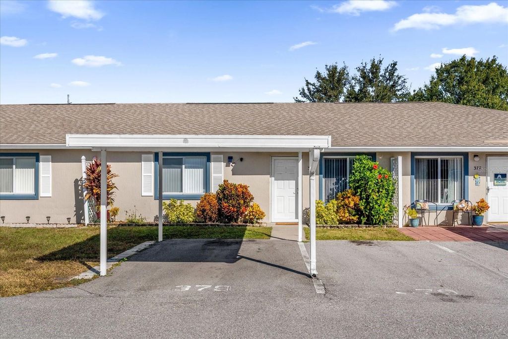 Photo of 379 Winter Ridge Boulevard #379, Winter Haven, FL 33881 (MLS # O6360787)