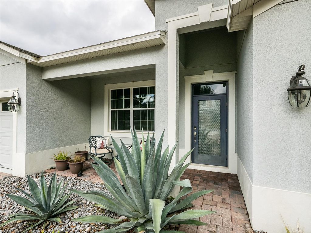 Photo of 1098 Harmony Lane, Clermont, FL 34711 (MLS # TB8463072)