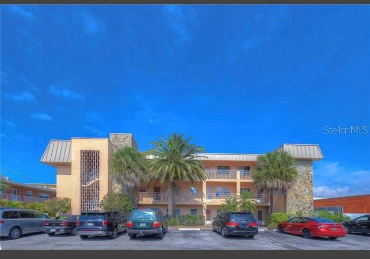 This bright and airy, fully furnished two-bedroom, one-bath end unit is located on the second floor, offering plenty of natural light. It's been well-maintained and is in great condition. At 750 square feet, it features central A/C and comes with one assigned parking space . Plus, it's just one block from the beach and has an elevator and laundry on-site!