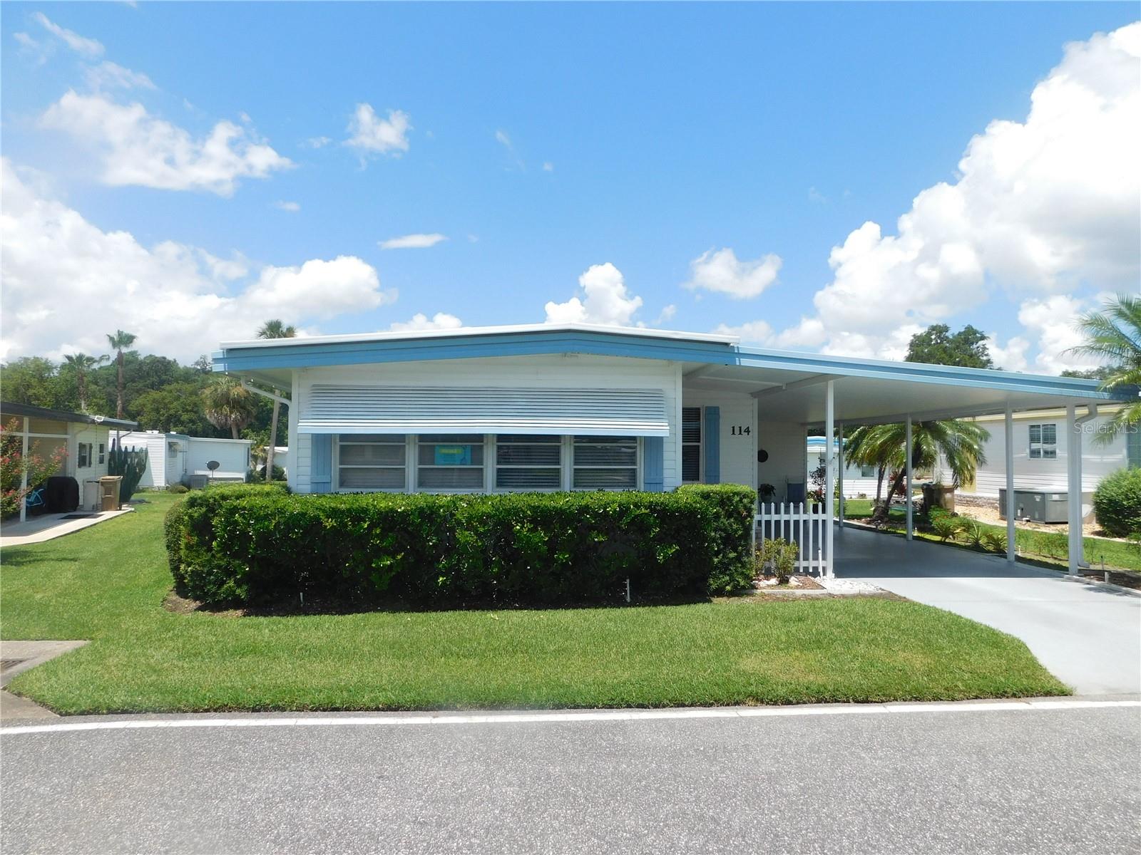 Welcome to your next chapter in this beautifully maintained 2-bedroom, 2-bath home nestled in the vibrant and secure 55+ gated community of Hawthorne at Leesburg. Whether you're looking to downsize or enjoy a more relaxed pace of life, this move-in-ready home offers the perfect blend of comfort, convenience, and peace of mind.
* Spacious open-concept living and dining area
* Bright, fully-equipped kitchen with plenty of storage
* Master suite with private bath
* Guest bedroom perfect for visitors or a home office
* Florida Room has heat and air and can be used year round.
*Community Amenities Include:
* Gated entry with 24/7 security
* Medical alert systems for added safety
* Clubhouse with social activities and classes
* Swimming pool, hot tub, and fitness center
* Convenient access to nearby shopping, dining, and healthcare
Enjoy the freedom of low-maintenance living in a supportive, active adult community. Whether you're relaxing at home or taking part in community events, you'll feel right at home here. Hawthorne at Leesburg is a private, gated 55+ community that offers everything to keep you entertained, without the congestion often found in other communities. You can be busy every day of the week or relax at the pool. Amenities Included in Your Maintenance Fee: Hawthorne’s courtesy bus will pick you up & drop you off right at your door for weekly trips to stores, banks, and malls. Fitness room available Library on site Wi-Fi available in our spacious club house Garden plots available for residents to grow vegetables & flowers Storage area for boats, recreational vehicles & trailers Outdoor geo-thermally heated swimming pool & two enclosed therapeutic pools Men’s & women’s sauna Twenty-four (24) tournament class, lighted shuffleboard courts affiliated with the Florida Shuffleboard Association Northern District. Four tennis courts (two lighted), three pickleball courts. They also have four bocce courts, a Softball field (for men’s & women’s teams), a Putting area, & an 18-hole pitch & putt course. There are two dragon boats for recreational & competitive use. Three card rooms are located in the main recreation hall, where you can enjoy games like Bridge, Mahjong, or Arizona Rummy. A billiard room with four championship tables. How about a game of croquet with friends? Amenities are available at an extra cost. Please check with the HOA for the current fees. Marina with over 120 boat slips, mostly covered, as well as a boat launch on site. Fully equipped woodcrafters’ shop with over 1500 square feet of space. A laundromat is on the premises, featuring commercial-sized washers and dryers (coin-operated). Hawthorne hosts a concert series each year, featuring artists from around the country. Many travel to see our concerts from areas around Central Florida. The following emergency services are included in your monthly maintenance fee: • Hawthorne has private emergency services dedicated solely to the community. • Three state-certified firefighters/emergency medical technicians (EMTs) are on duty 24 hours a day, seven days a week, every day of the year, including holidays. • Three emergency response vehicles are available 24/7. • A gatehouse is staffed at the main entrance 24/7. • Hawthorne has monitored private entrances with bar code-accessed gates 24 hours a day, seven days a week. • State-of-the-art emergency alarm buttons in each home are designed to summon EMTs in mere minutes.
