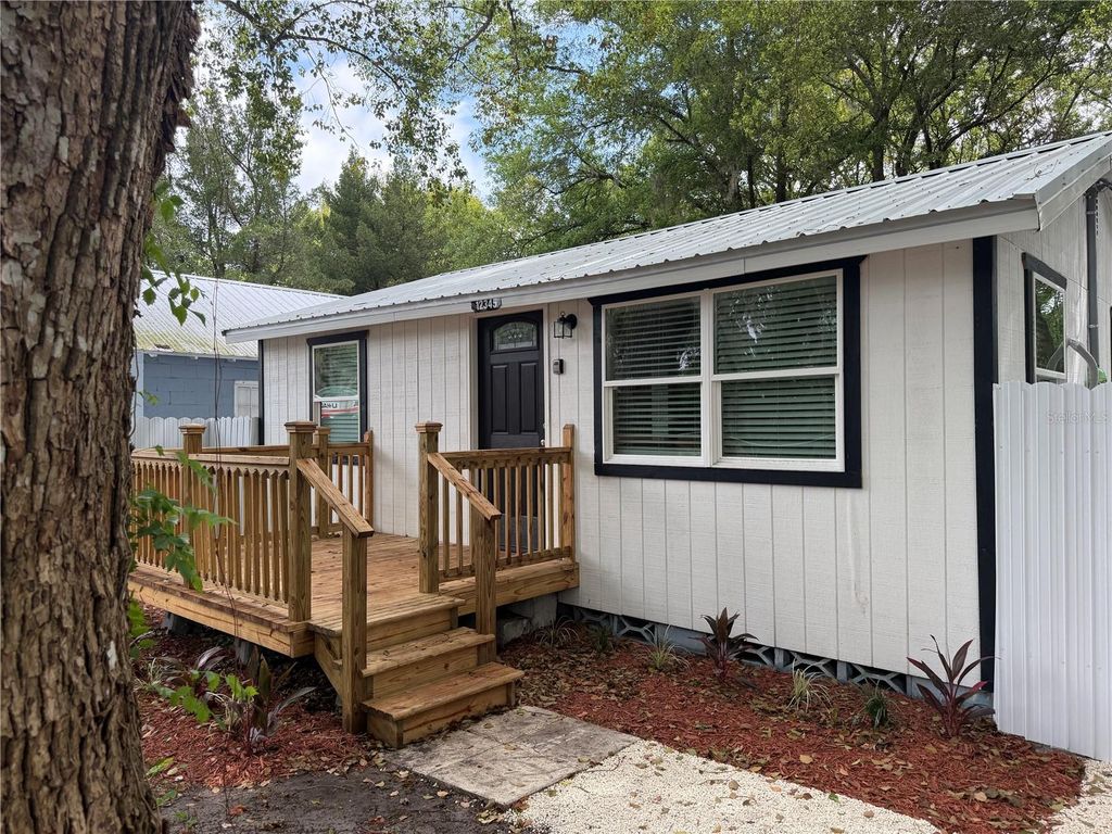 Photo of 12345 SE 135th Terrace, Ocklawaha, FL 32179 (MLS # OM721737)