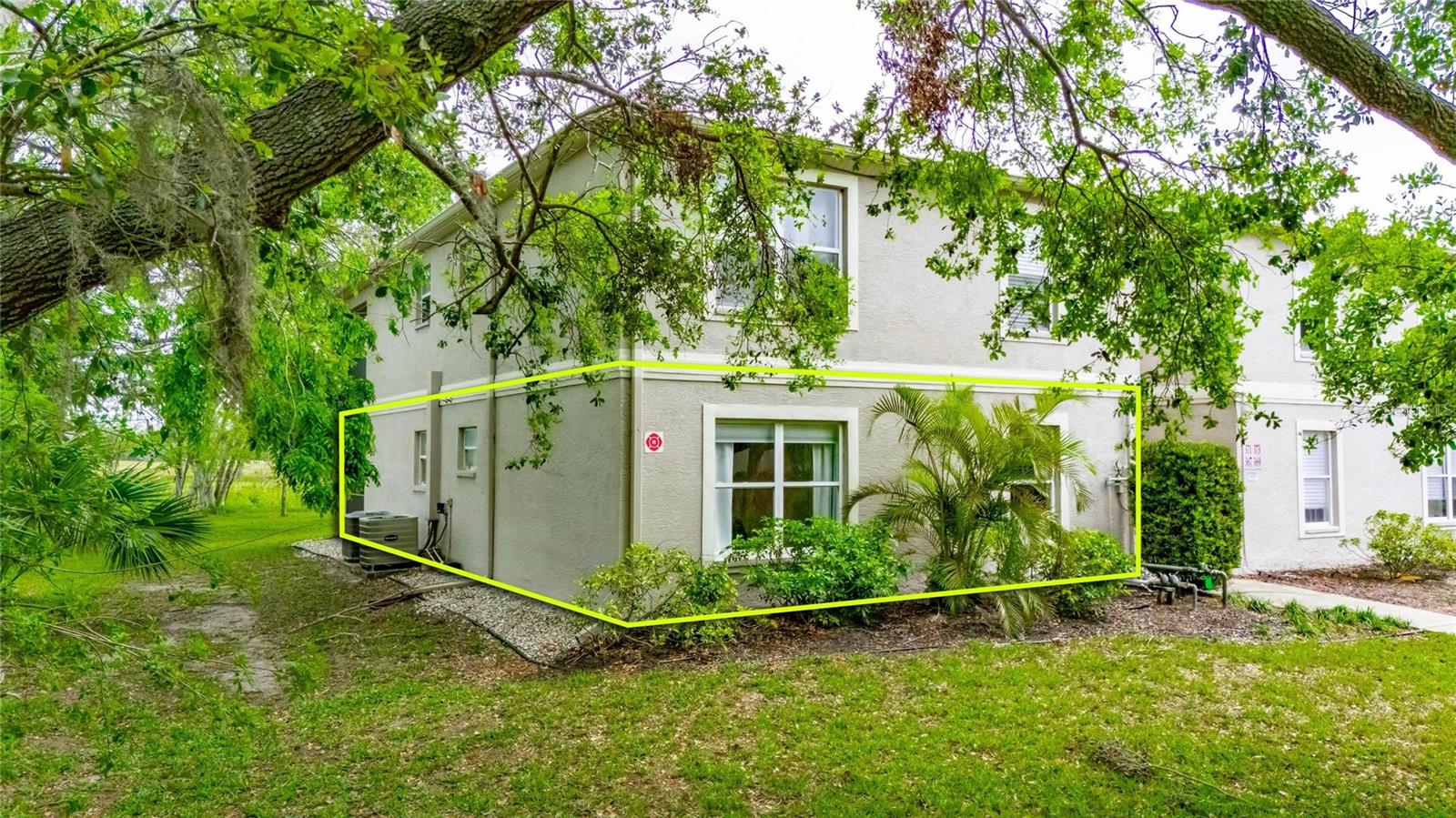 367 Bobby Jones Road – Location, location, location! This coveted first-floor corner unit is tucked away at the back of the community with peaceful conservation and waterfront views. Located in the quiet, maintenance-free community of The Hideaway, this move-in ready condo features 2 bedrooms, 2 full baths, and 1,334 square feet of spacious living. Enjoy panoramic views of the newly redesigned Bobby Jones Golf Course, a tranquil creek with a gentle waterfall, and surrounding conservation land. Inside, you'll find tile flooring throughout (no carpet), a large living room with crown molding, a flex-space den, and a separate dining area with chandelier lighting. The bright kitchen includes a convenient pass-through to the dining room, recessed lighting, and newer appliances including the oven and dishwasher. Both bathrooms have been recently updated with modern tile showers. Additional features include a full-size in-unit laundry area, generous storage, and a 120-square-foot screened lanai—ideal for relaxing with morning coffee and a private view. This unit also comes with two prime parking spaces located just steps from the front door. Community amenities include two pools (one just steps from your home), walking trails, and mature oak trees. The HOA covers exterior maintenance and insurance (including a new 2024 roof), water, sewer, trash, pest control, and pool service. No CDD, no age restrictions, and minimal leasing rules make this a great full-time residence, seasonal retreat, or investment opportunity. Just minutes from Downtown Sarasota, I-75, Legacy Trail, and top-ranked beaches. Property can be purchased turn-key furnished.