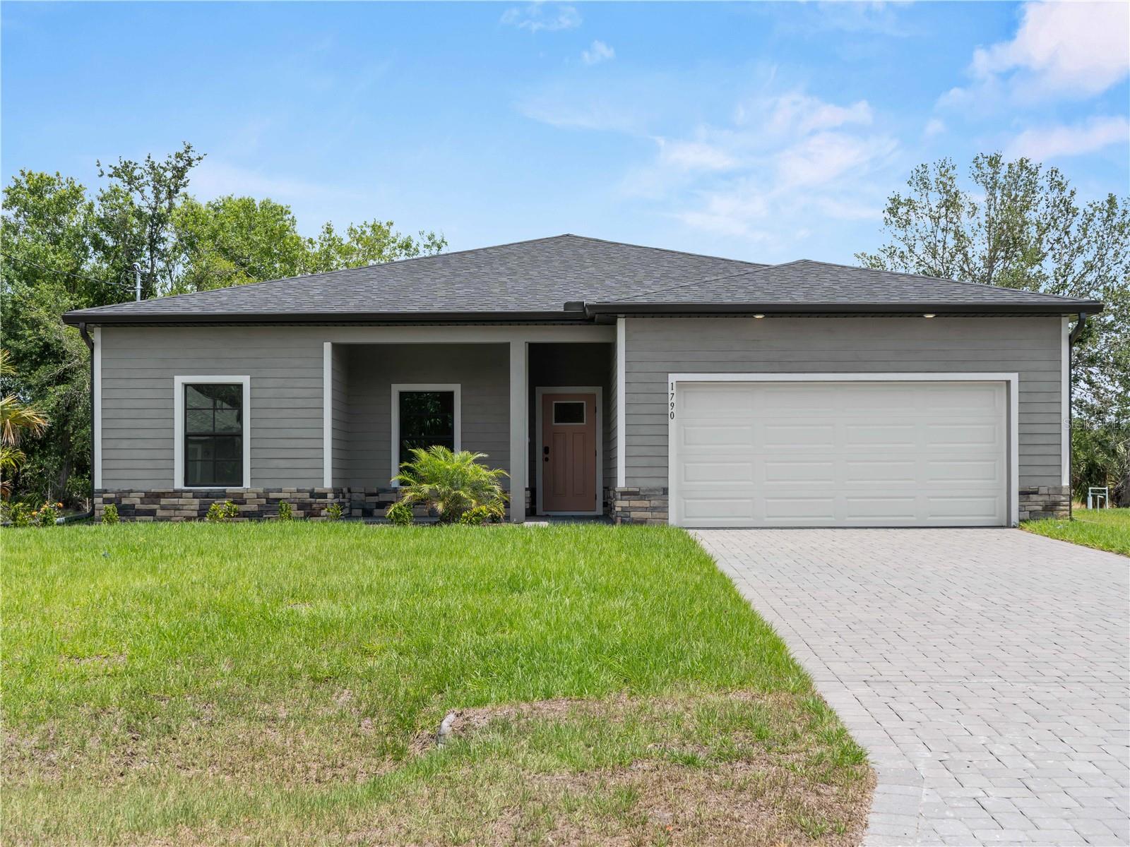 Nestled in the serene and rapidly growing community of North Port, this brand-new 4-bedroom, 2-bathroom residence offers 1,710 square feet of meticulously designed living space. With a thoughtful split floor plan, this home seamlessly blends modern luxury with practical features to cater to today's discerning homeowner.
Key Features:
Waterfront Living: Enjoy tranquil mornings and picturesque sunsets with direct access to a scenic canal, perfect for kayaking, fishing, or simply unwinding by the water's edge.
Durable and Stylish Flooring: The entire home boasts wood-look tile flooring, combining the aesthetic appeal of hardwood with the durability and low maintenance of tile.
Gourmet Kitchen: Culinary enthusiasts will appreciate the sleek quartz countertops, offering ample space for meal preparation and entertaining.
Storm-Ready: Fitted with impact-resistant windows, this home provides enhanced safety during Florida's stormy seasons, ensuring peace of mind for you and your family.
Energy Resilience: Equipped with a whole-house generator plug, be prepared for any power outages, ensuring continuous comfort and security.
Elegant Exterior: The paver driveway not only adds to the home's curb appeal but also offers durability and ease of maintenance.
Quality Assurance: Benefit from the included home warranty, providing an extra layer of protection and confidence in your investment.
Premium Finishes: Throughout the home, you'll find upgraded finishes that exemplify attention to detail and superior craftsmanship.