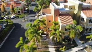 Palmas del Mar – Corner Residence with Exceptional Light and Airflow
Welcome to the only available corner unit in the community—an exceptional home that stands out for its enhanced natural light and cross-ventilation, offering a fresher and brighter atmosphere than neighboring properties.
This beautifully maintained home features three spacious bedrooms and three full bathrooms, along with a modernized kitchen complete with granite finishes. Step outside to a lush grass-covered yard and a covered patio—perfect for entertaining or simply relaxing in privacy.
The first floor welcomes you with an open-concept layout that connects the living and dining areas to an expansive terrace, ideal for indoor-outdoor living. The updated kitchen, opens to a cozy family space—an inviting setting for making cherished memories.
Upstairs, the primary suite boasts soaring ceilings, a walk-in closet, and an en-suite bathroom. Two additional bedrooms share a bathroom, and a laundry area with linen storage is conveniently located in the hallway. Every bedroom and common area is equipped with energy-efficient mini-split A/C units for year-round comfort.
On the third level, you’ll find a stunning rooftop terrace offering panoramic views of El Yunque Rainforest—an ideal space to unwind, entertain, or enjoy breathtaking sunsets.
This home is move-in ready and blends comfort, modern aesthetics, and thoughtful functionality.
Prime Location: Just a short walk from the resort-style community pool and surrounded by world-class amenities—two championship golf courses, a full-service marina, scenic golf cart trails, equestrian facilities, tennis and pickleball courts, and a variety of shops and restaurants.
Families will appreciate the proximity to The Palmas Academy, a top-rated private, college-preparatory school serving grades Pre-K through 12—right within the community gates. Schedule a private showing today and experience Palmas Del Mar lifestyle.