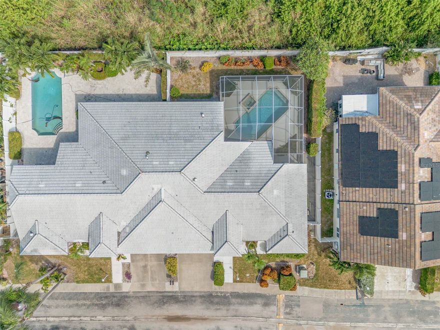 Private swimming pool and spa is all yours! Spacious 2-bedroom, 2-bath single-story pool condo with hot tub and lanai is tucked away in a private enclave near the world-renowned IMG Academy. With 1,762 sq. ft. of style and comfort, this property is move-in ready and waiting for you.

Inside, vaulted ceilings and an open layout create a light-filled atmosphere. The split floor plan offers privacy, while the expansive primary suite features dual closets and serene comfort. Multiple glass sliding doors open to your spacious covered patio, blending indoor and outdoor living seamlessly with tropical landscaping.  

Step out to your heated pool and spa, surrounded by tropical landscaping and offering ultimate privacy—the perfect place to relax or entertain. This maintenance-free community includes roof, lawn care, and WiFi, so you can spend more time enjoying life and less time on upkeep. AC was replaced in 2024 with a Trane brand, known for top quality and comfort. The concrete roof was replaced in 2016, and it is maintained by the HOA. 

Located minutes from IMG Academy, Sarasota/Bradenton Airport, Gulf beaches, fine dining, and Sarasota’s vibrant cultural scene, UTC Mall, Ringling Museum of Art, the new Mote Marine Aquarium, and Pop Stroke Golf.  This home offers the best of Florida living in a highly sought-after area. This home is ideal for owners' access to golf, fishing, and boating, where your lifestyle has no boundaries. Roof replaced in 2016, Trane A/C replaced in 2024. 

Schedule your private showing today before it’s gone!