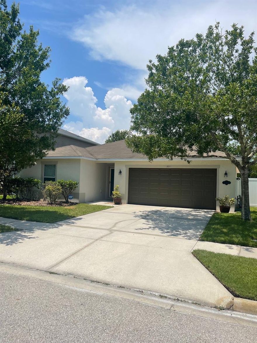 This spaciously thought out 3 bedroom, 2 bath is located 5 minutes to I-95, only 20 minutes to I-4, and 11 minutes to the oceans seashore.  The neighborhood, Isles of Sugar Mill, is small and consists of only one street with a front and rear entrance and two cul-de-sac streets making this subdivision ideal for slow and low traffic perfect for family growth and/or commuting to work. There is a lovely community pavilion to sit under shade and watch your kids play on the playground, or cross the street enjoy some summertime family pool days.  There is a very long stretching paved pedestrian trail for dog walking or exercise located at the front of the neighborhood. For the avid golfers, this pocket location of town is ideal providing back streets and easy access to most all of the New Smyrna Beach golf courses.  Isles of Sugar Mill is close to all the new home subdivision community growth and activities but small enough to offer quaintness and be removed from the construction of large subdivisions.  

The house itself is a single story well thought out space with separated bedrooms and a large "open concept" family room.   the patio off the main living area is covered and fully screen enclosed. A new white vinyl fence was recently installed for kids and animal safety, plus privacy.  Speaking of privacy, just beyond the fenced back yard is a greenspace area that will not be developed. The yard is large enough for a private pool addition if so desired. ;Water: City