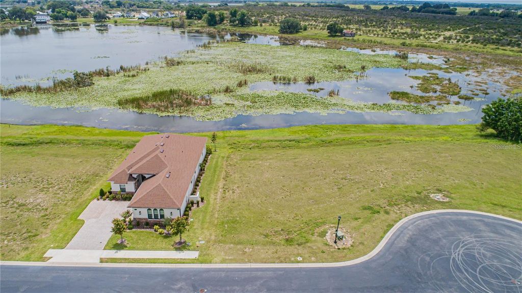 Photo of 120 Caladium Avenue, Lake Alfred, FL 33850 (MLS # O6377429)