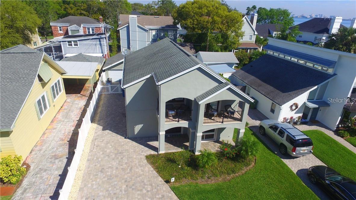 Bayshore Beautiful at it’s finest! PLANT SCHOOL DISTRICT!This timeless open floor plan with water views from the living room and second level balcony are what living near Bayshore is all about. The kitchen boasts custom self closing cabinets, stainless steal LG gas appliances and travertine floors. New hurricane and energy efficient windows installed throughout the house in 2018. With the vaulted cathedral ceilings in the oversized master you will have plenty of room to rest your head. The master closet truly has enough room for two with the upgraded California closet to maximize organization and style. Enjoy morning coffee overlooking Tampa Bay from both guest bedrooms and their off suite balconies each morning. If you love entertaining this is the home for you! Custom built salt water pool with a Carrera marble swim up bar with four barstools. Never touch a manual lever again for your pool with the Pentair app your pool and jacuzzi heat, light colors, schedule etc are all handled from your phone. California closets in the garage allow you to maximize your organization and keep all your BBQ tools readily accessible for grilling outdoors. It is a true entertaining home with indoor/outdoor living. Tenant to pay for Pool and Lawn maintenance.