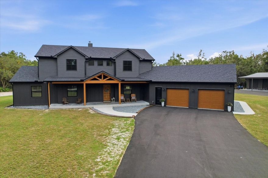 Welcome to your dream property — a brand new 2025-built custom home perfectly situated on 10 beautiful acres, offering the ideal blend of luxury, functionality, and country living. This stunning 5-bedroom, 3 full bath, and 2 half bath home was thoughtfully designed with space and comfort in mind. Step inside to an open-concept floor plan featuring a dedicated home office and an additional flex/bonus room, perfect for a media space, gym, or guest suite. The home is energy-efficient and spray-foam insulated throughout, equipped with two hot water heaters and two HVAC units to keep every room perfectly comfortable year-round. For added peace of mind, a solid poured-concrete safe room is built right into the home. Outside, you’ll find a newly paved blacktop driveway leading to a dream setup for hobbyists or professionals: a 30x70 workshop with full spray-foam insulation, electric service, and 12-ft lean-tos on both the front and back for extra covered space. The workshop also includes a car lift and a 50-amp RV hookup, making it a true multi-use space for all your projects and toys. Enjoy the peace and privacy of country living with plenty of room to expand, garden, or simply relax on your own private acreage — all while being just a short drive from town conveniences. Step out and enjoy the natural beauty and abundant wildlife that call this property home — from peaceful deer to songbirds and other native species, this acreage offers the perfect country retreat for outdoor enthusiasts and nature lovers.