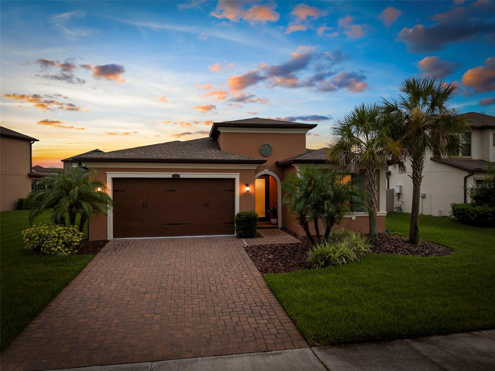 ***Welcome to 4929 Tivoli Dr — A Rare Single-Story Gem***Located in the prestigious and highly coveted Estancia at Wiregrass Ranch, this home sits in the heart of Wesley Chapel—where luxury, style, and everyday convenience come together. Known for its upscale amenities, scenic surroundings, and prime location, Estancia offers a lifestyle like no other—and now, we bring you a home like no other. This rare single-story home is one of only two available in the neighborhood, making it a truly exceptional opportunity. Step into serenity and sophistication with this 2020 Anastasia model: a meticulously maintained 3-bedroom, 3-bathroom home with a versatile den enclosed by elegant French doors with glass paneling. The bright, open floor plan is filled with natural light and thoughtfully designed to blend comfort and contemporary flair. Beautiful wood-plank ceramic tile, designer lighting, and refined finishes set the tone throughout. The chef-inspired kitchen overlooks the spacious family room and opens seamlessly into the dining area and expansive covered lanai—ideal for both entertaining and relaxed everyday living. Designed to impress, the kitchen showcases luxurious details including 42-inch Alpine overlay cabinetry with crown molding, satin nickel hardware, quartz countertops, and stainless steel GE appliances—uniting style and functionality. The luxurious owner’s suite serves as a tranquil retreat with a walk-in closet, oversized walk-in shower, separate soaking tub, and two separate vanities, all complemented by spa-like finishes. The additional bedrooms are generously sized, and the secondary bathrooms echo the home’s clean, modern aesthetic—one even features a stylish dual vanity for added convenience. Step outside to the large covered lanai, which invites the outdoors in and offers the perfect setting for lounging or entertaining. There’s ample space to design your dream pool and create your own private oasis. Situated in Estancia’s exclusive gated section of Cortona, residents enjoy world-class amenities including a grand clubhouse, resort-style pool with massive water slide, tennis and pickleball courts, dog parks, scenic walking trails, and more. All just minutes from top-rated schools, shopping, dining, hospitals, and major highways. With timeless finishes, a flexible single-story layout, newer construction, and unmatched community features—this home is more than a place to live; it’s a lifestyle to love. Schedule your private showing today and experience one of Estancia’s most sought-after floor plans and enjoy a level of resort-style living that truly sets this community apart.(Virtual Staging: The primary bedroom photo has been virtually staged to showcase a different furniture arrangement)