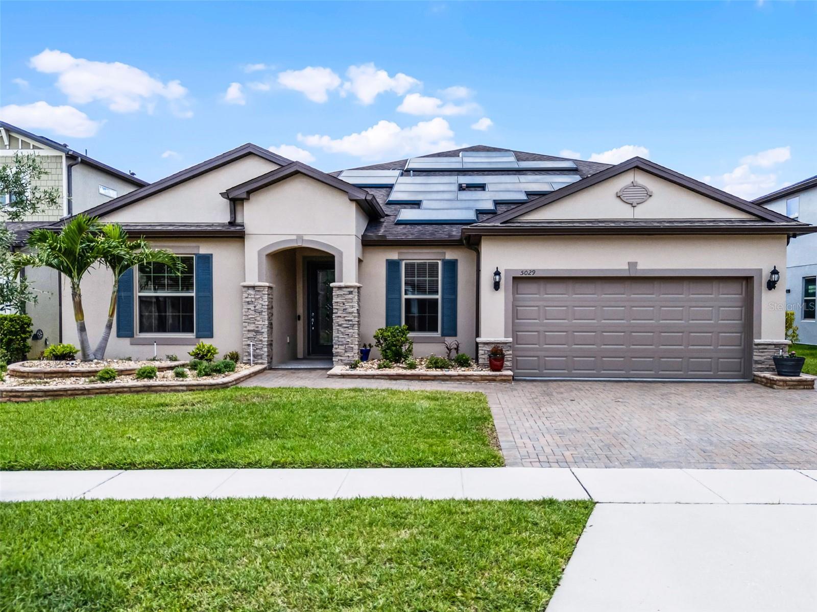 Step into elegance and comfort with this stunning 6-bedroom, 3.5-bathroom Dockside with Loft model by Pulte Homes, located in the heart of St. Cloud and minutes from Lake Nona’s Medical City. Boasting over $300K in upgrades, this beautifully appointed home is truly one-of-a-kind. Enjoy breathtaking water views and a Florida lifestyle enhanced by FULLY PAID OFF SOLAR PANELS with Tesla backup batteries, and a custom gas outdoor kitchen perfect for entertaining. Highlights Include: Over $300K in Upgrades, Solar Panels with Tesla Batteries, Custom Built-in Cabinets and closets in Bedrooms & Laundry Room, Upgraded Flooring, Crown Molding, Fully sliding pocket glass doors, 4” extension to the garage, Ceiling Fans, Pre-wired for Speakers, Gourmet Kitchen, Upgraded Glass Entry Door, Freshly Painted Inside & Out, Epoxy-Coated 3-Car Tandem Garage with Utility Sink & Storage Shelves, Water Softener, Gutters, & Professional Landscaping. Inside, you'll find a private office with glass double doors and a large front-facing window, a spacious open layout, and a first-floor primary suite complete with a sitting area, spa-like bath, and walk-in closet. Upstairs features a huge loft, media room, two bedrooms, and a full bath—perfect for guests or a growing family. The extended covered lanai runs the length of the home and opens to a lush green yard overlooking the pond, ideal for relaxing or entertaining. Community Amenities including direct Access to Lake Toho via Fells Cove, Dock & Fishing Pier, Leasable Boat Slips, Resort-Style Pool, Clubhouse, Gym, Party Room, Playground, Walking Trails, Basketball Court, virtual GUARDED GATE, Low HOA, NO CDD! Located walking distance to top-rated elementary and middle schools, with easy access to Lake Nona, USTA, Orlando International Airport, 417 & 528, this home offers the perfect blend of serenity, luxury, and convenience. Welcome to Waterfront Luxury in the Gated Community of Lakeshore at Narcoossee! PRICED TO SELL! Don’t miss your chance to own this waterfront paradise—schedule your private showing today and experience Florida living at its finest!