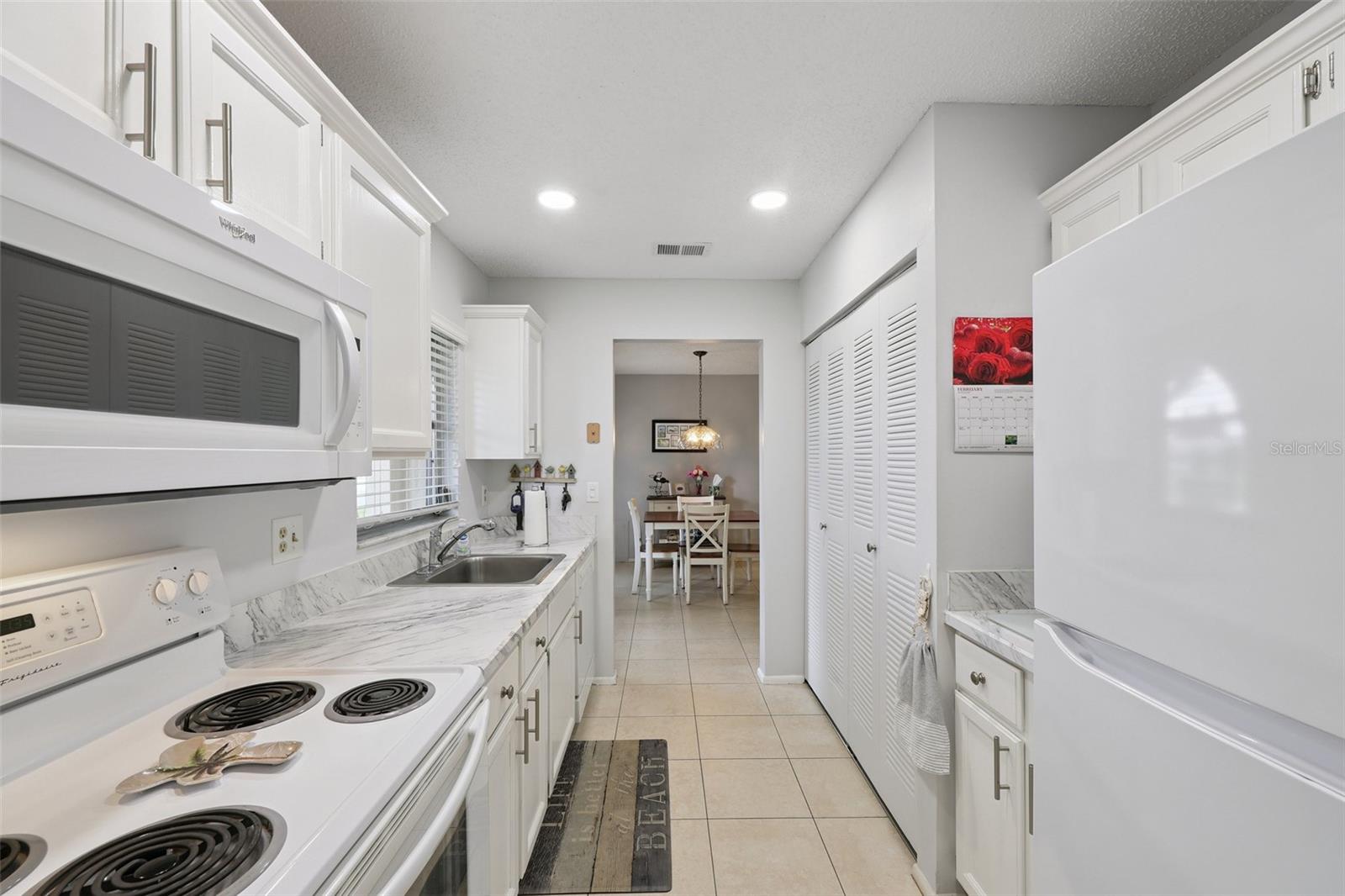 CORTEZ VILLAS CONDO 4 PH B - Residential