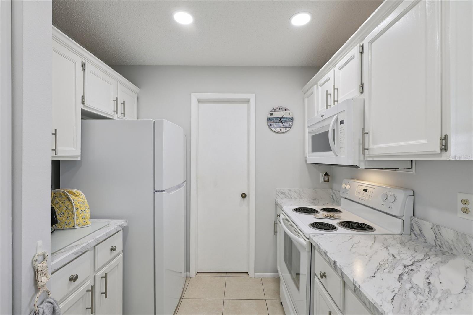 CORTEZ VILLAS CONDO 4 PH B - Residential