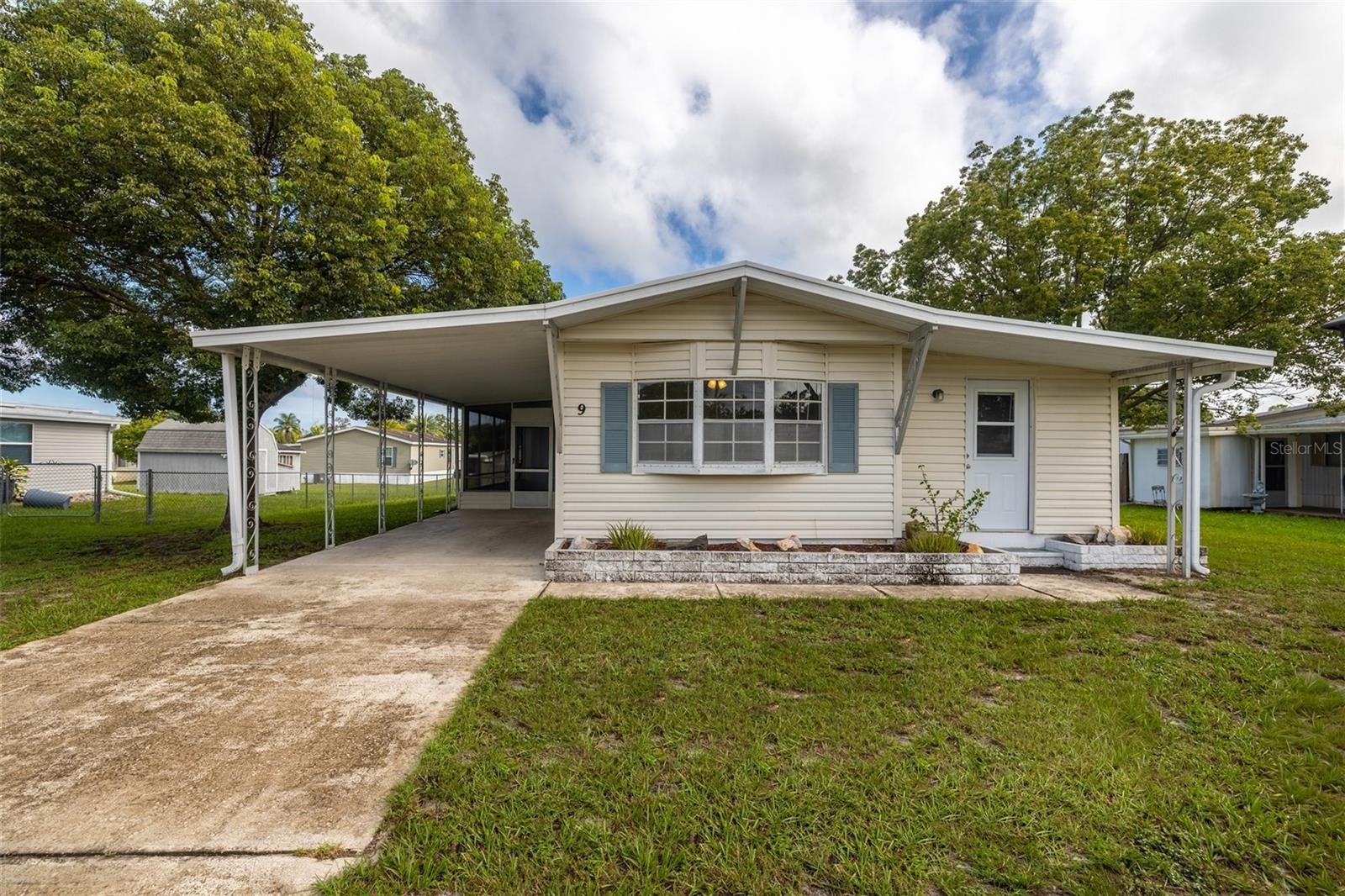 Charming and affordable 2-bedroom, 2-bath home in the desirable Terra Alta community of DeBary, offered at just $185,000! This light and bright home features a spacious split-bedroom floor plan for added privacy, a large kitchen with plenty of cabinets and countertop space, all appliances included, making this home truly move in ready. Other features include a versatile bonus room perfect for a home office, den, bedroom or hobby space. Enjoy the convenience of an inside laundry area, covered carport parking and a metal roof. The interior is filled with natural light, and the big, screened porch is perfect for relaxing or entertaining year-round. With an optional HOA, you’ll enjoy the flexibility of minimal fees while still being part of a well-maintained community. Located close to shopping, dining, medical facilities, and I-4 for easy commuting, this home offers a great combination of comfort, convenience, and value. Whether you’re a first-time buyer, downsizing, or looking for a seasonal getaway, this one checks all the boxes. Schedule your showing today—homes in Terra Alta don’t last long!