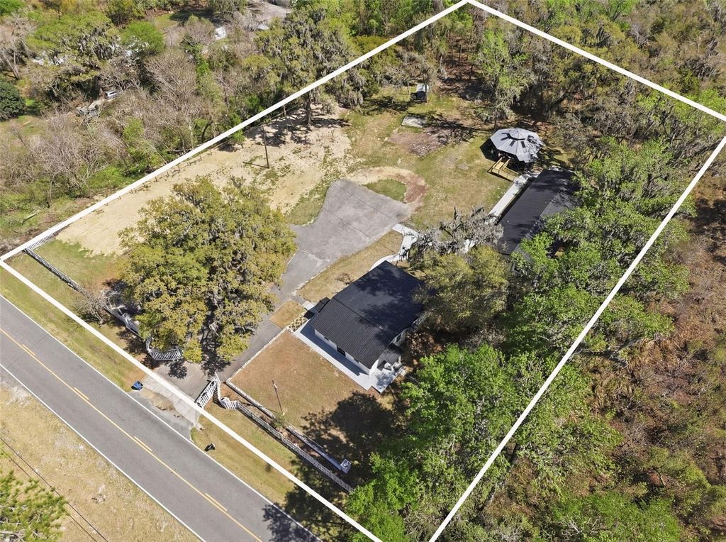 Photo of 15458 Snow Memorial Highway, Brooksville, FL 34601 (MLS # W7883652)