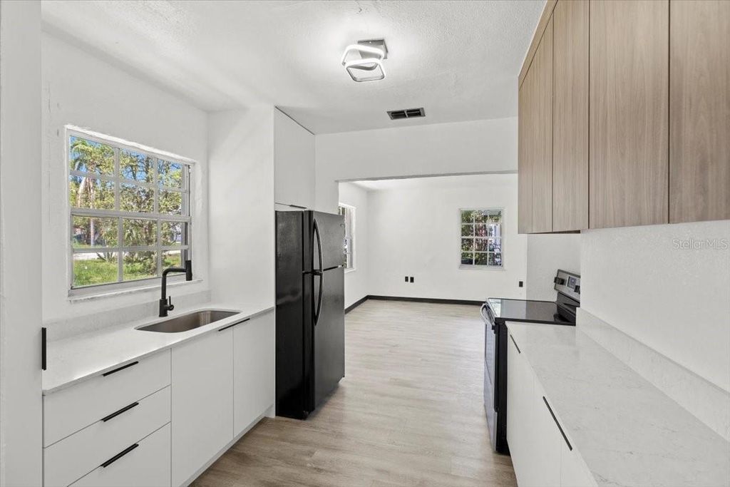 Photo of 1512 Hillside Drive, Tampa, FL 33610 (MLS # TB8453136)