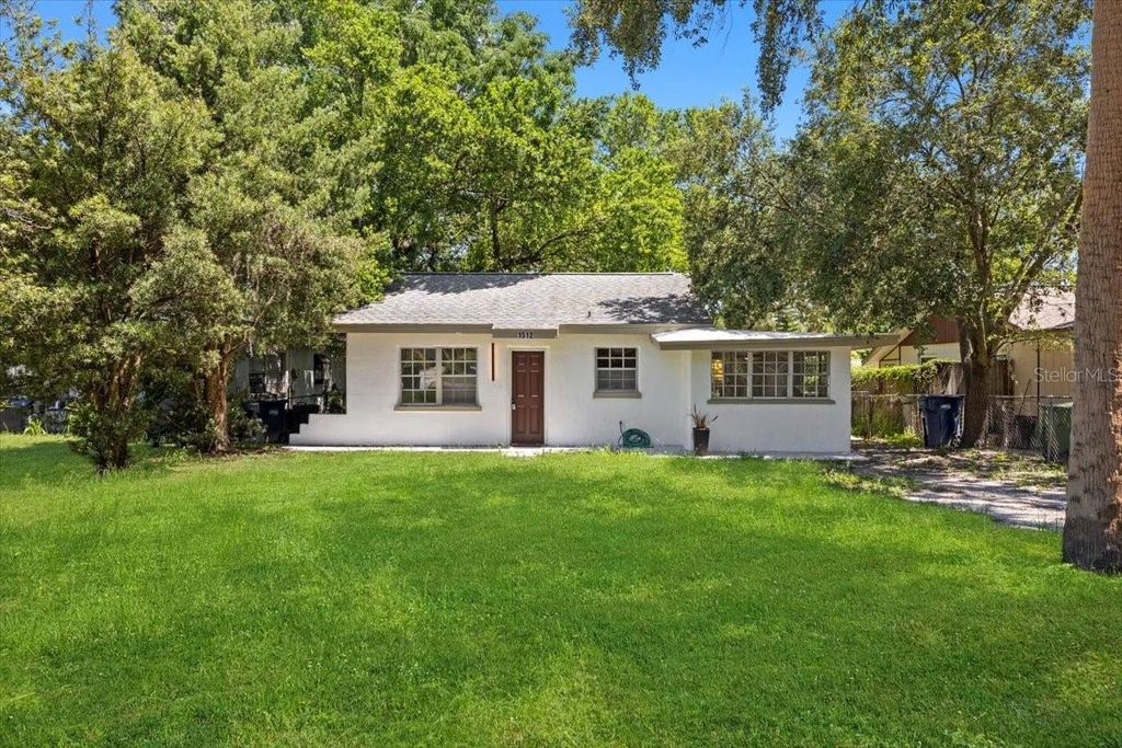 Photo of 1512 Hillside Drive, Tampa, FL 33610 (MLS # TB8453136)