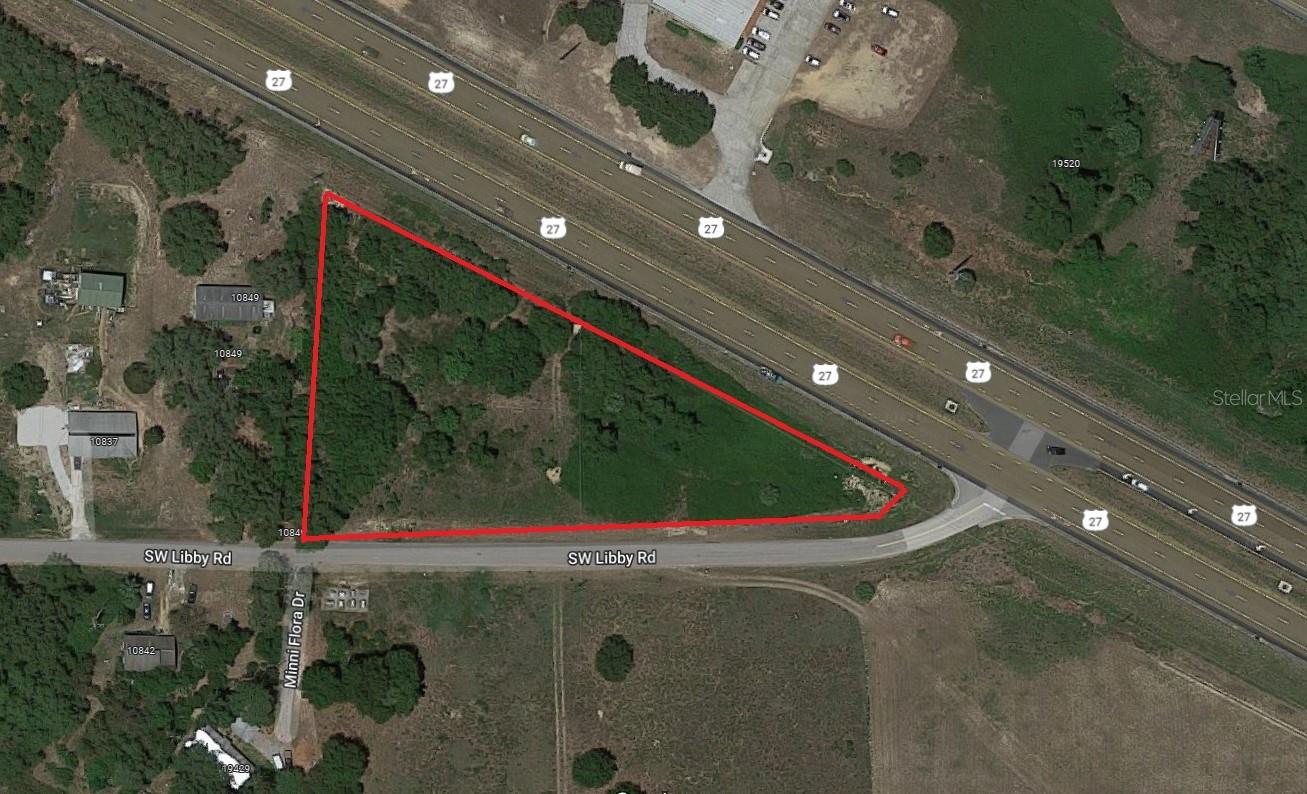 Rare Opportunity to Acquire Prime Commercial Frontage on US 27! This exceptional 1.5 acres property offers direct US 27 frontage with convenient rear access, providing maximum visibility and ease of entry from both directions — perfect for your business’s exposure. Zoned C-2 by the City of Groveland, this site offers a range of commercial possibilities. Please direct any questions regarding potential uses or permitting to the City of Groveland, which oversees all zoning and regulations. The property is available for outright purchase or a lease option to buy for qualified clients. A current survey is on file — inquire today for additional details and to explore this opportunity.