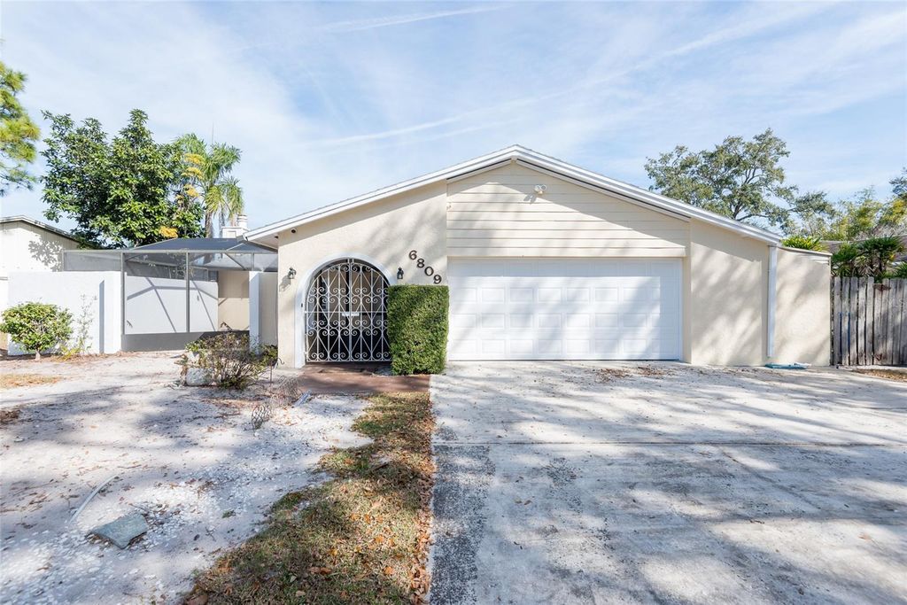 Photo of 6809 Twelve Oaks Boulevard, Tampa, FL 33634 (MLS # TB8469377)