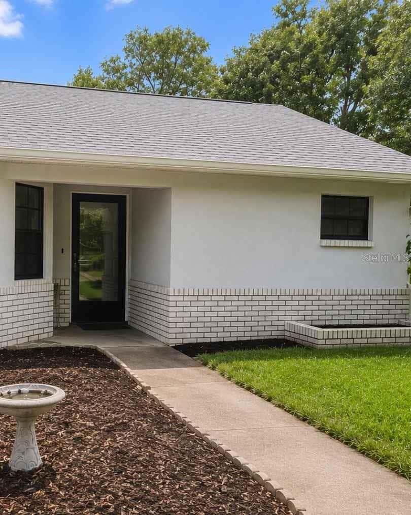 Photo of 3249 Bluestone Avenue, Spring Hill, FL 34609 (MLS # W7888592)