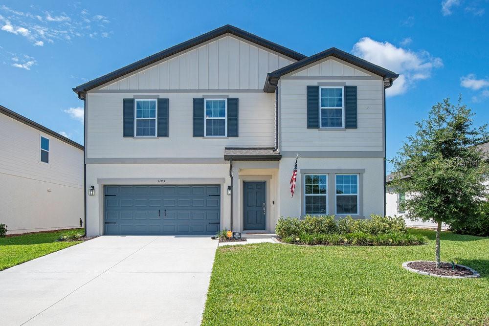 Welcome to this stunning 2-year-old home with a rare, large, covered patio in the highly desirable Hampton Oaks community! Designed for modern living, this spacious 2-story residence offers an open floor plan with generously sized living areas, perfect for both relaxing and entertaining. Step inside to discover a large kitchen featuring a center island, ample cabinetry, large pantry and seamless flow into the dining and family room areas. Need a home office or flex space? Enjoy the convenience of a versatile room on the first floor—ideal for remote work or playroom. Upstairs, you’ll find oversized bedrooms that provide plenty of comfort and space for everyone, spacious laundry room, cozy loft and lots of storage. The real gem? A large covered patio overlooking the expansive backyard—ideal for outdoor dining, gatherings, or simply enjoying Florida’s beautiful weather. Located just minutes from I-4, this home offers quick access to shopping, dining, and commuting routes—an unbeatable combination of convenience and comfort. Don’t miss your chance to own this exceptional property in a prime location!