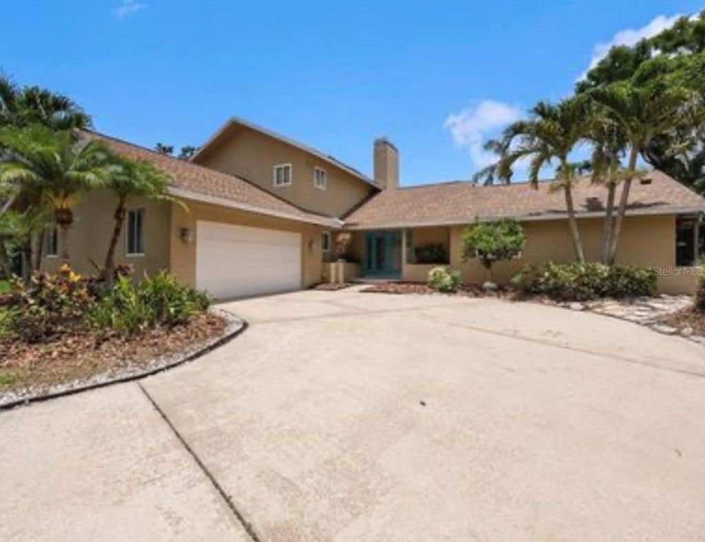 Photo of 115 Lake Shore Drive E, Palm Harbor, FL 34684 (MLS # TB8471519)