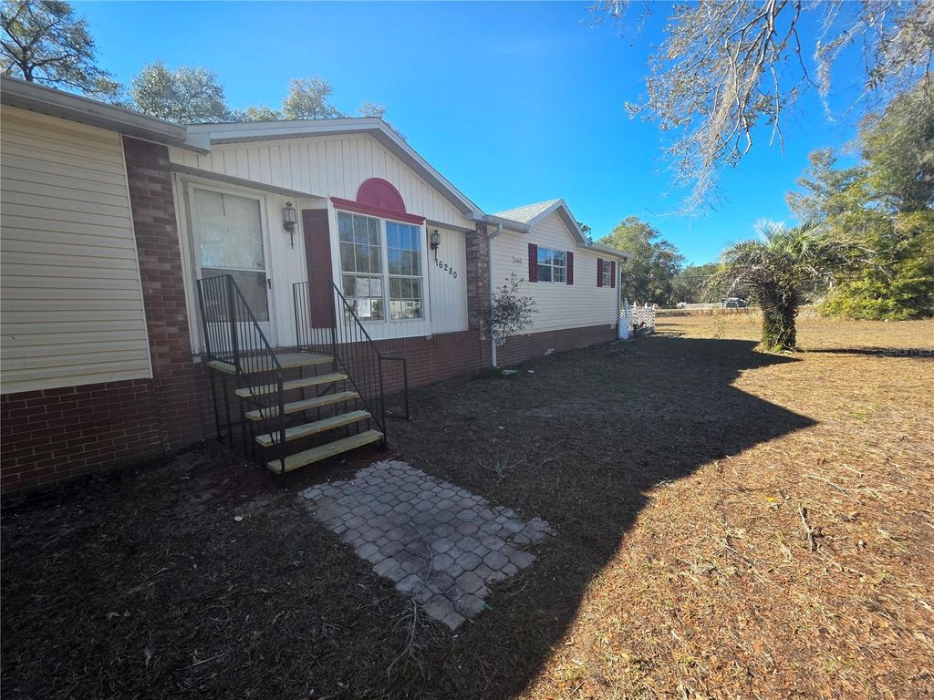 Photo of 16280 Tampa Street, Brooksville, FL 34604 (MLS # TB8469196)