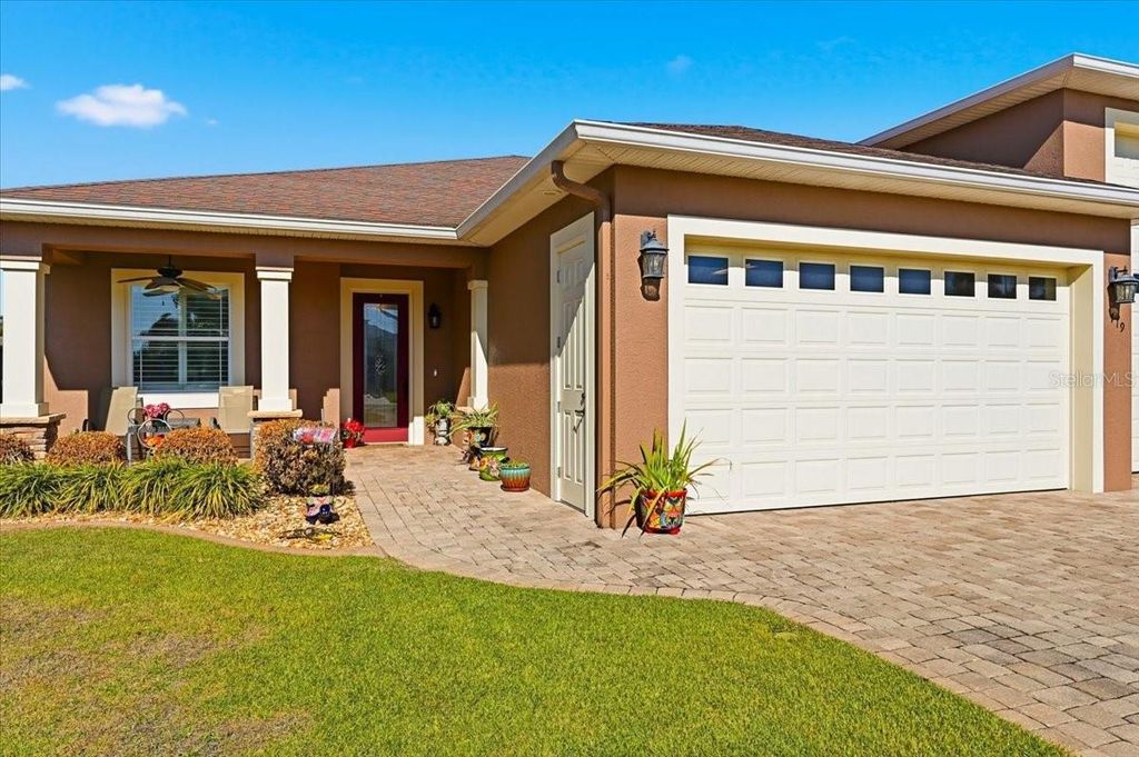 Photo of 719 Teaberry Trail, Polk City, FL 33868 (MLS # L4959184)