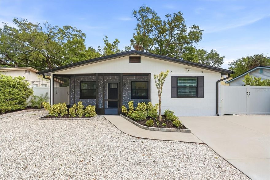 Welcome home to this rare opportunity to own a meticulously updated residence in Port Tampa City, located in a non-flood zone (X500) where every major system has been perfected for ultimate peace of mind. This home has undergone a massive transformation featuring nearly $150,000 in high-end upgrades, including a roof replacement by Westfall Roofing that comes with a 25-year warranty and a Wind Mitigation Certificate. Hurricane rated windows just installed last month 23k with transferable warranty. The mechanical systems are top-tier, highlighted by a 2024 Rheem 3-Ton Endeavor AC system featuring a variable blower, custom ductwork, and a WiFi thermostat. You’ll also find a brand-new tankless water heater, a whole-house water filtration system, and an Attic Breeze solar exhaust fan. For the tech-savvy buyer, the home is guarded by a Moen Flo smart water monitor with auto-shutoff and a Ring security suite. The interior reflects a fresh, modern aesthetic with a stunning Craftsman door, all-new flooring, professional house paint, and custom window blinds. No detail was overlooked in the electrical overhaul, which features a 200 Amp service upgrade including a lightning arrestor, new panel, and dedicated dryer and range feeds. For added safety, the home is equipped with whole-house Alumicon connectors. Step outside to an expansive outdoor oasis designed for both utility and relaxation. The property features a massive $10,000 driveway extension, professional landscaping with decorative pavers and shell accents, and a fully fenced yard with premium vinyl fencing and a custom Golden Eagle gate. Storage is easy with the 2024 Tuff Shed, and recent professional tree work ensures a manicured, park-like feel. Located just minutes from MacDill AFB and the Westshore Marina District, this is truly a turn-key sanctuary designed for the modern buyer. Full upgrade sheet available.