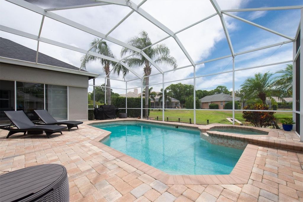 Photo of 3716 Janus Way, Palm Harbor, FL 34685 (MLS # TB8385823)
