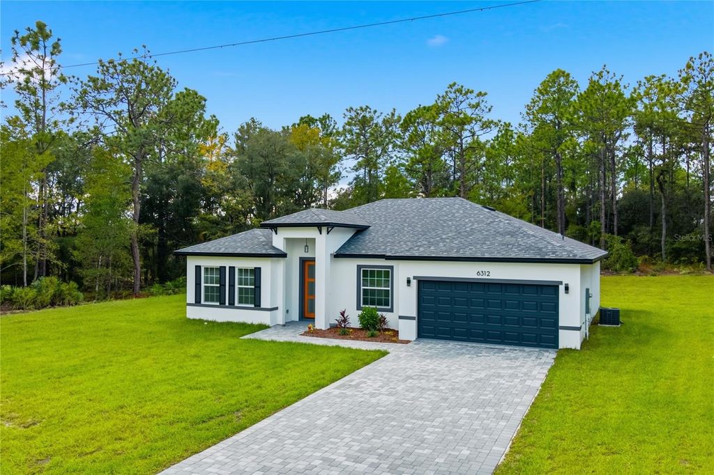 Photo of 6312 SW 144th Lane Road, Ocala, FL 34473 (MLS # O6356292)